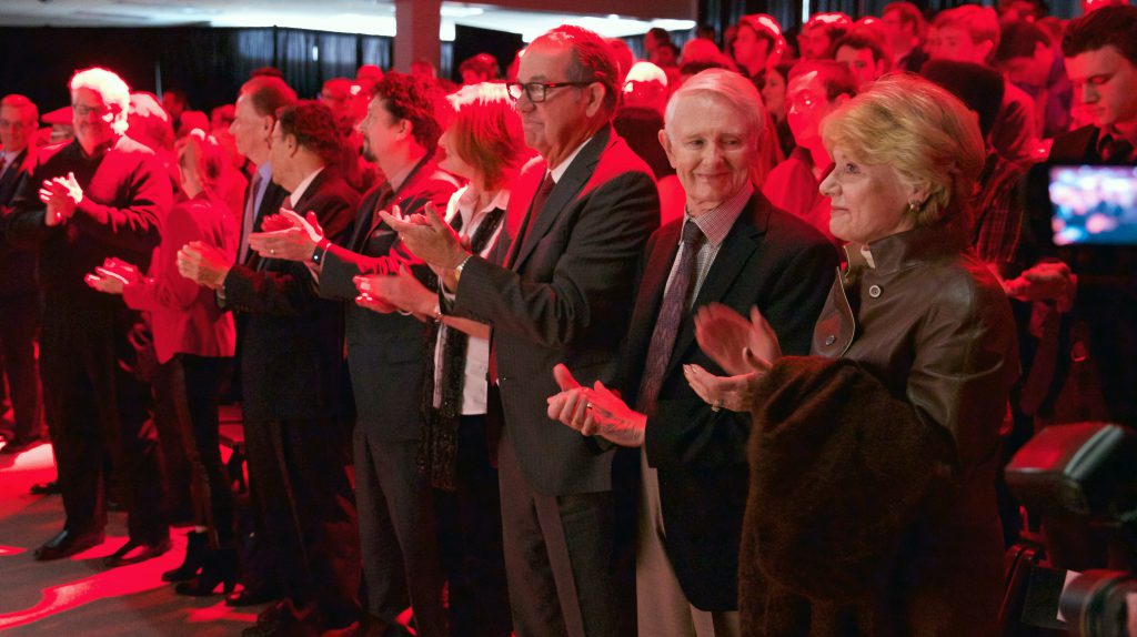 Members of Johnny Carson's family and the Carson Foundation applaud as the song There is No Place Like Nebraska is played during the Nov. 6 gift announcement. Pictured (from right) is Karlyn Carson, Dick Carson, Jeff Sotzing, Peggy Sotzing, Larry Witzer, Allan Alexander and Larry Heller.