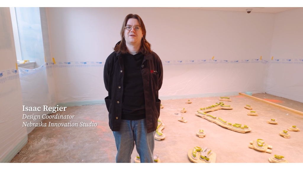 Isaac Regier (Nebraska Innovation Studio - Frontier Tech Lab) supported Morrill Hall’s newly renovated fossil dig by 3D printing and dyeing bones to closely match the color of real fossils. 