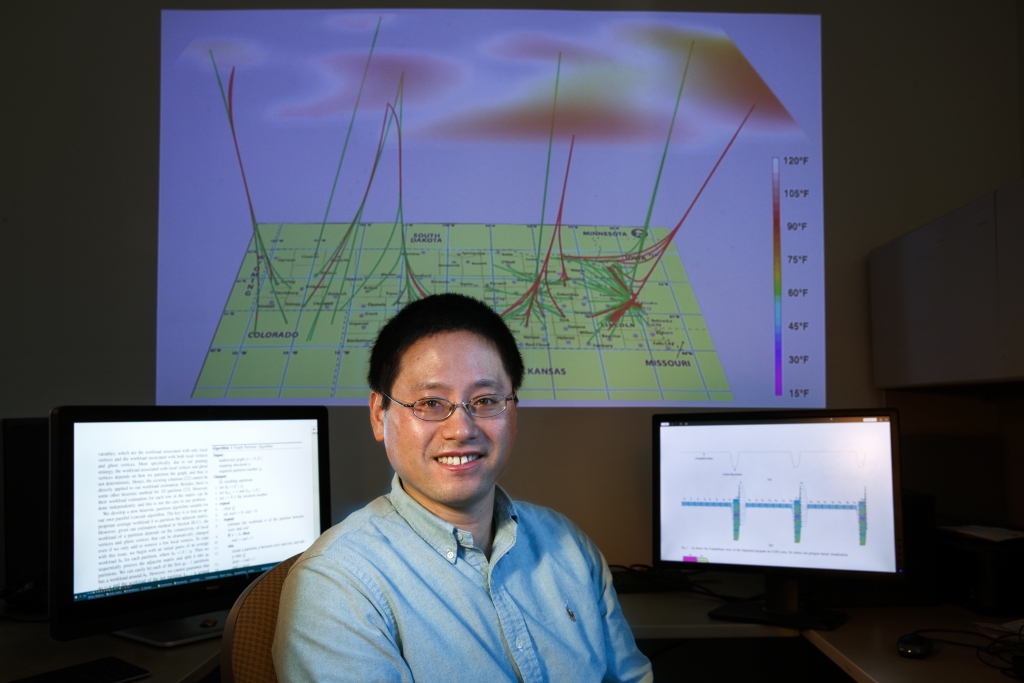 Hongfeng Yu, assistant professor in computer science and engineering, is working with scalable visualization solutions that are efficient and practical for very large graph datasets.  March 8, 2017.  Photo by Craig Chandler / University Communication