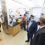 Joshua Santarpia, Ted Carter and others on tour of Collaborative Biosecurity Laboratory