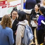 students at research poster session