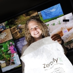 Georgina Bingham holding air-tight, insect-resistant bag