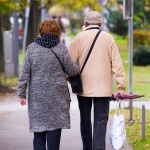 elderly couple walking