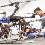 Researchers working ona drone