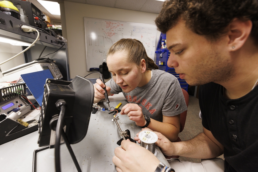 Undergrads working on robotics component