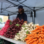 vendor at farmers market