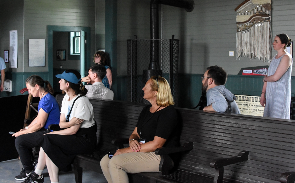 participants in session at Red Cloud railroad depot