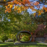 campus scene with building and trees