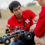 Dung Hoang Tran with small programmable vehicle