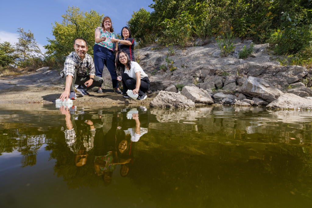 Xu Li, Bing Wang, Shannon Bartelt-Hunt and Yusong Li collecting water samples