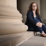 Katrina Jagodinsky sitting on steps