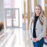 Natalie Chisam standing in hallway