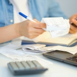 Person reviewing receipts