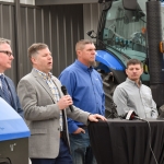 industry and UNL reps unveil methane powered tractors