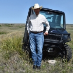 Homer Buell in a field