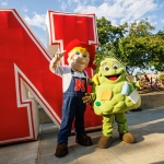 Herbie Husker poses for a photo with LandPhil during the Chancellor’s Barbecue on the Nebraska Union plaza on Aug. 21. Phil is the waste-diversion mascot for the City of Lincoln.